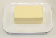 [1] ein handelsübliches Stück Butter
