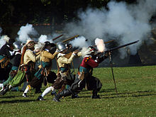 [1] Musketiere bei der historischen Nachstellung einer Schlacht