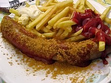 [1] Currywurst-Schranke (auch Currwurst rot-weiß genannt) dürfte der meistgegessene Imbiss Deutschlands sein.