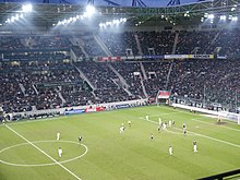 [1] Fußballspiel vom Flutlicht beleuchtet