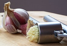 [1] Knoblauchpresse
