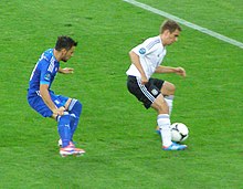 [1] ein Verteidiger in einem EM-Spiel 2010 gegen Griechenland