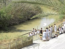 [1] eine Taufe im Fluss Jordan