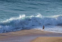 [1] brechende Welle am Strand