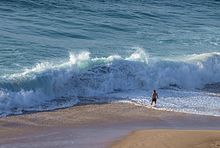 [1] brechende Welle am Strand