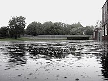 [1] Regenwasser auf der Straße